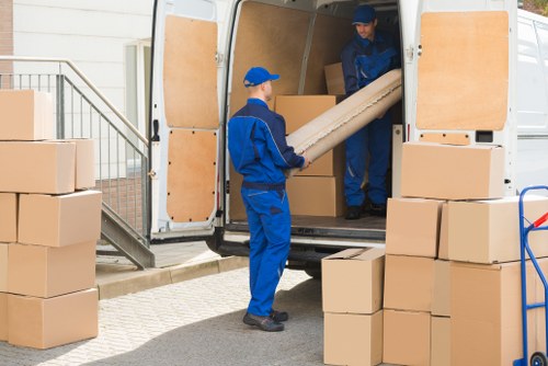 Office relocation planning in Shepherds Bush with business equipment and packed boxes