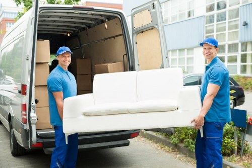 Removal van loading household furniture in Shepherds Bush