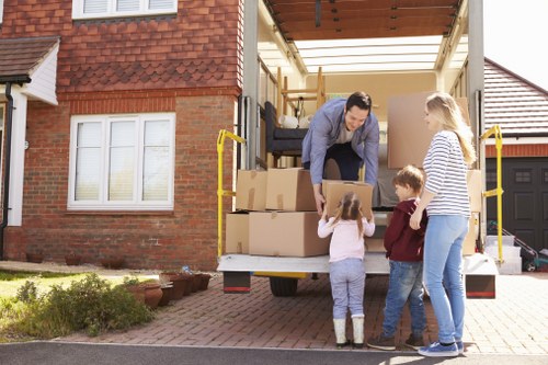 Secure loading of a piano into a removal vehicle for transport