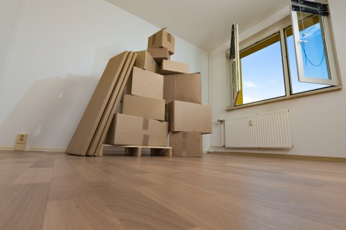 Removal van and moving crew handling a Shepherds Bush property move