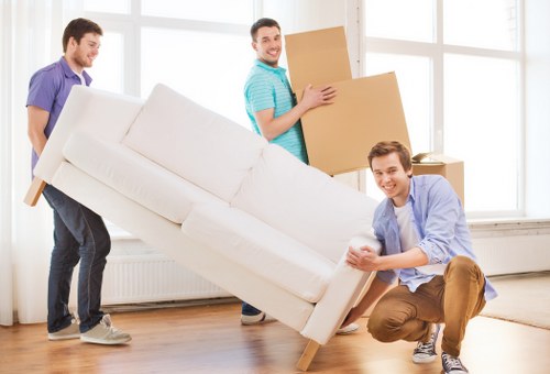 Loading furniture into a van for a Shepherds Bush property move