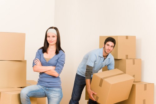 Loading furniture into a van for a Shepherds Bush home move