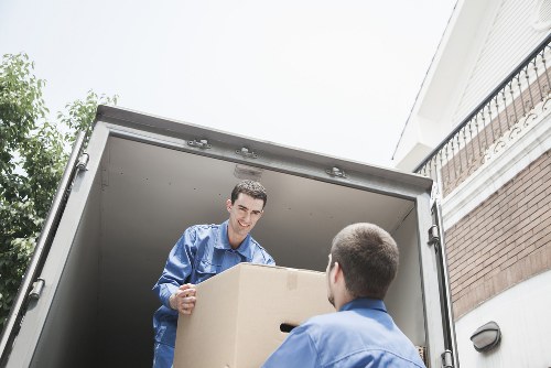 Professional team loading unwanted furniture during a Shepherds Bush pick-up job
