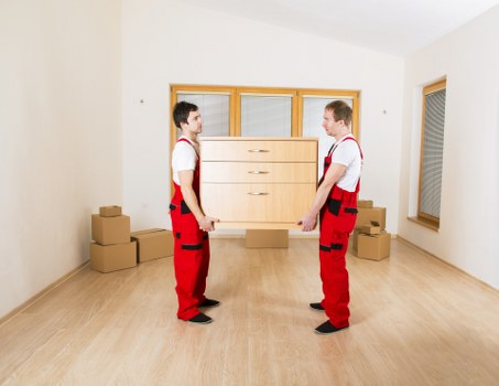 Packed boxes and home items prepared for a local move in Shepherds Bush